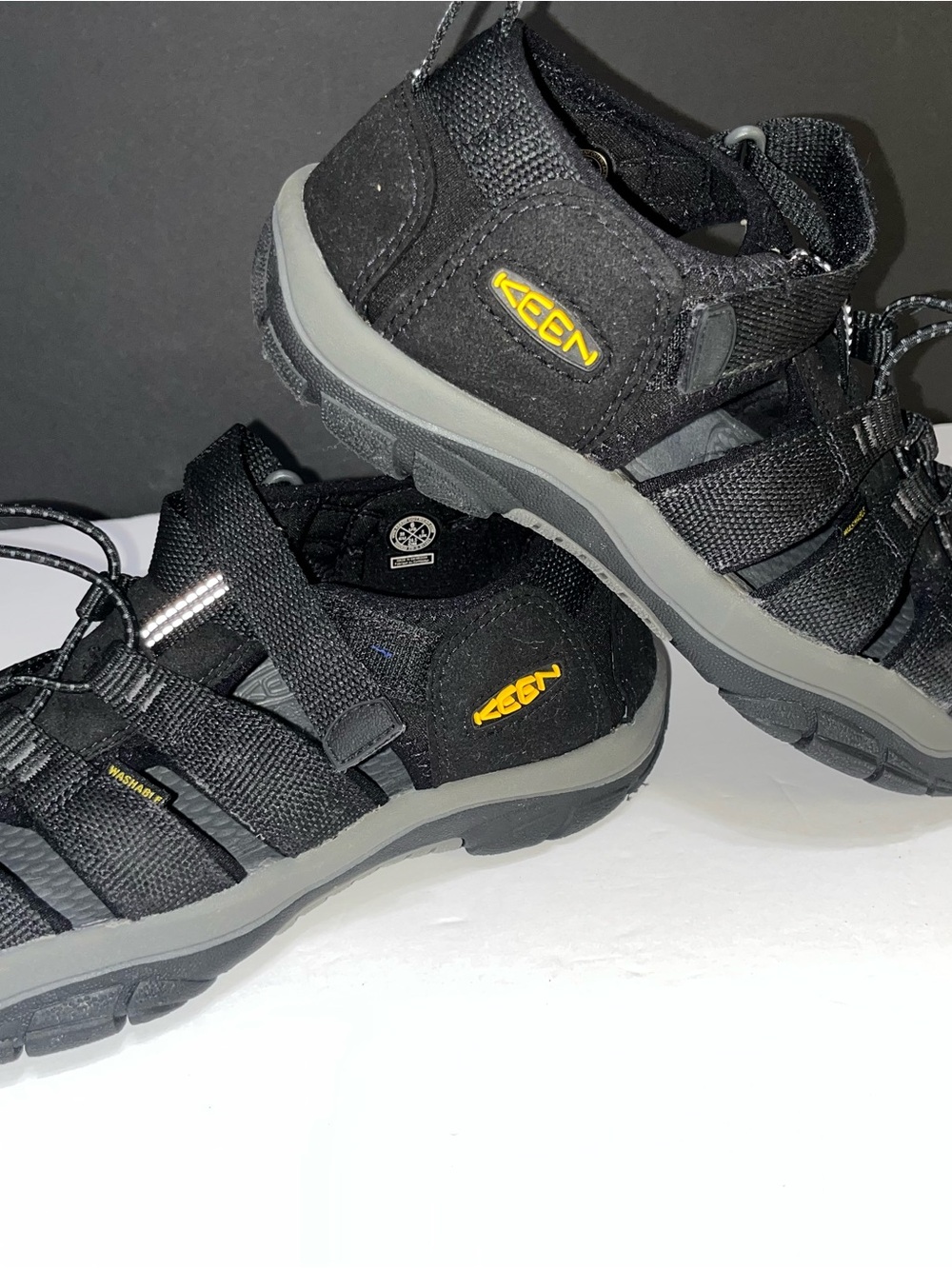 Keen Men's Black Sandals with Gray Soles and Yellow Logo